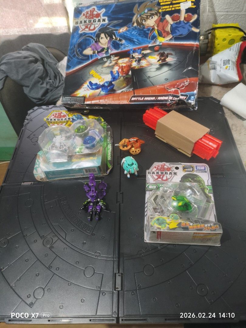 Bakugan Battle Arena and Figures (Category: Action & Battle Toys) located in Baguio. Submitted by baguiobeans (Listing ID 1423133243, Image 1). Description: - Bakugan Battle Arena included (box with wear). - Assorted Bakugan figures. - Some figures are unopened. - Includes Bakugan Legends figures. - Comes with a red cardboard tube. - Perfect for Bakugan enthusiasts!.