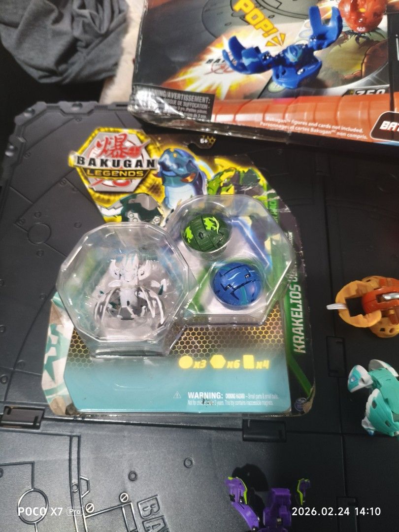 Bakugan Battle Arena and Figures (Category: Action & Battle Toys) located in Baguio. Submitted by baguiobeans (Listing ID 1423133243, Image 2). Description: - Bakugan Battle Arena included (box with wear). - Assorted Bakugan figures. - Some figures are unopened. - Includes Bakugan Legends figures. - Comes with a red cardboard tube. - Perfect for Bakugan enthusiasts!.