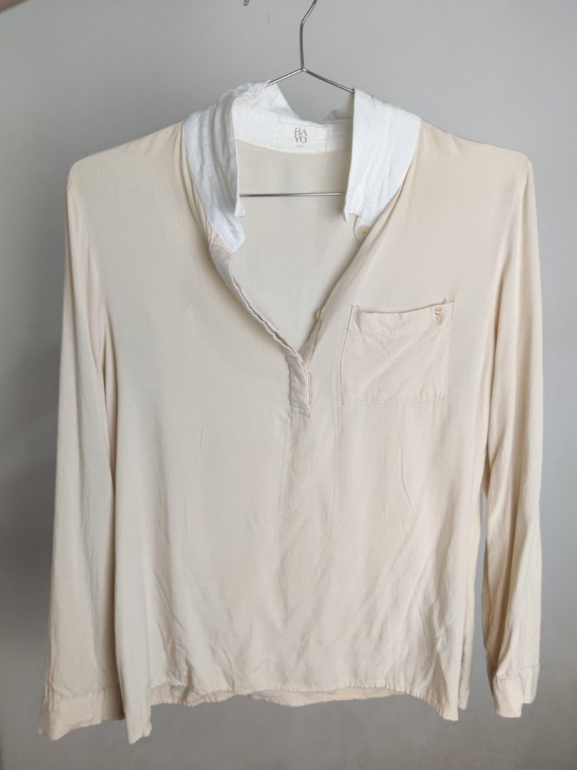 Bayo Classy Cream Long Sleeve Blouse (Category: Blouses) located in Cainta. Submitted by june.closet (Listing ID 1423239577, Image 1). Description: - Chest pocket with embroidered detail - Button-down style - Soft, lightweight fabric.