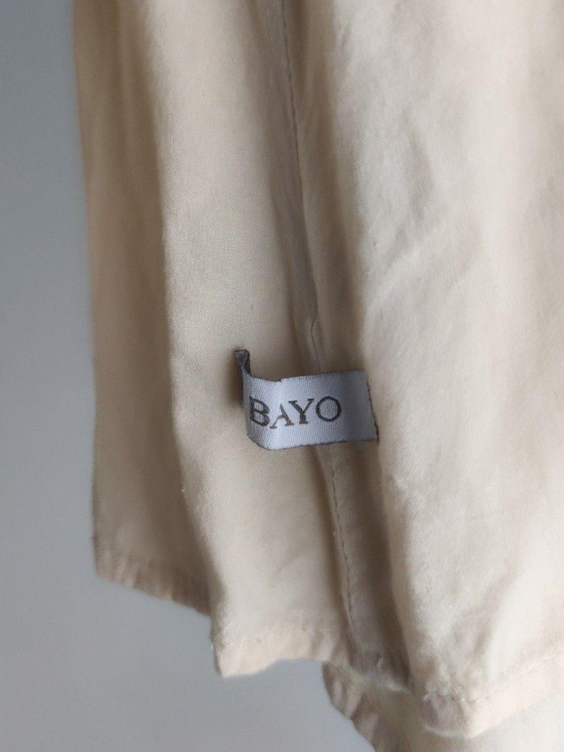 Bayo Classy Cream Long Sleeve Blouse (Category: Blouses) located in Cainta. Submitted by june.closet (Listing ID 1423239577, Image 3). Description: - Chest pocket with embroidered detail - Button-down style - Soft, lightweight fabric.