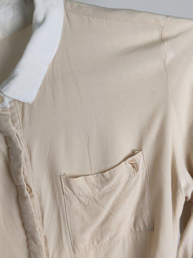 Bayo Classy Cream Long Sleeve Blouse (Category: Blouses) located in Cainta. Submitted by june.closet (Listing ID 1423239577, Image 2). Description: - Chest pocket with embroidered detail - Button-down style - Soft, lightweight fabric.
