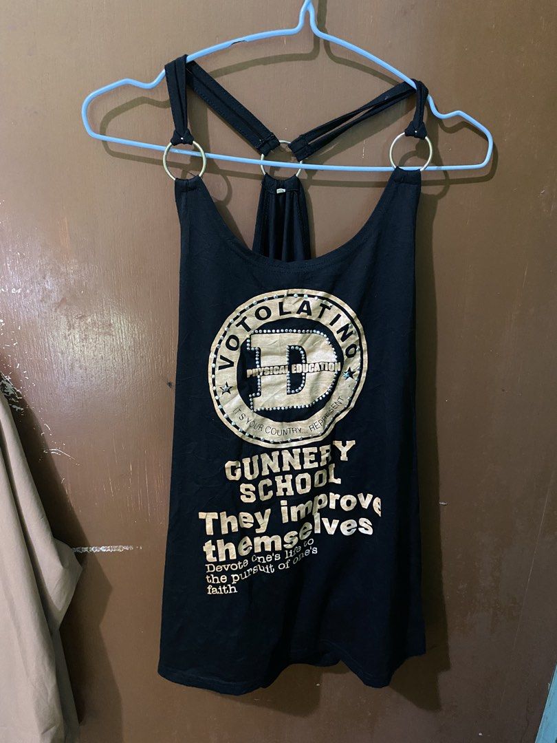 Black Tank Top with Graphic Print (Category: Sleeveless) located in Ozamiz City. Submitted by sw4gcvnt (Listing ID 1423238700, Image 1). Description: - Black tank top - Round neckline with ring details - Racerback style - Graphic print on front - Comfortable fabric - Plain black back - Stylish and versatile.