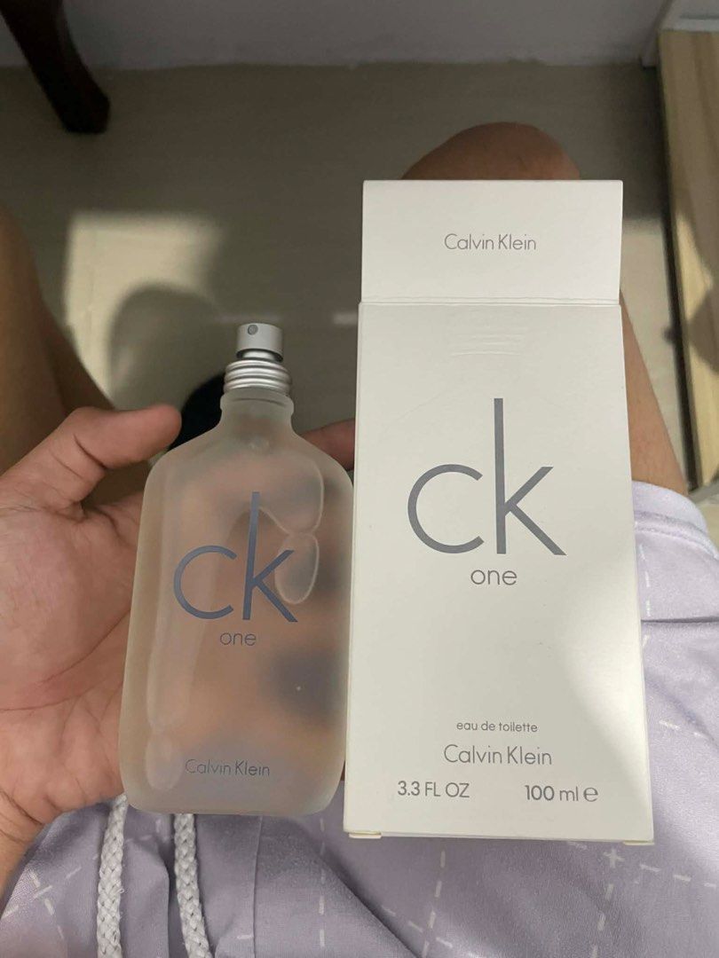 Calvin Klein CK One Eau de Toilette 100ml (Category: Fragrance & Deodorants) located in Bulacan. Submitted by icegemdy_ (Listing ID 1423208501, Image 1). Description: Forsale Ck one perfume 100 ml almost bnew tinest spray lang less than 4 sprays, bulacan location can do meet up or ship anywhere. 4k nabile to 2k nalang! - Calvin Klein CK One Eau de Toilette - 100ml bottle - Includes original box - Eau de Toilette fragrance - Frosted bottle design 