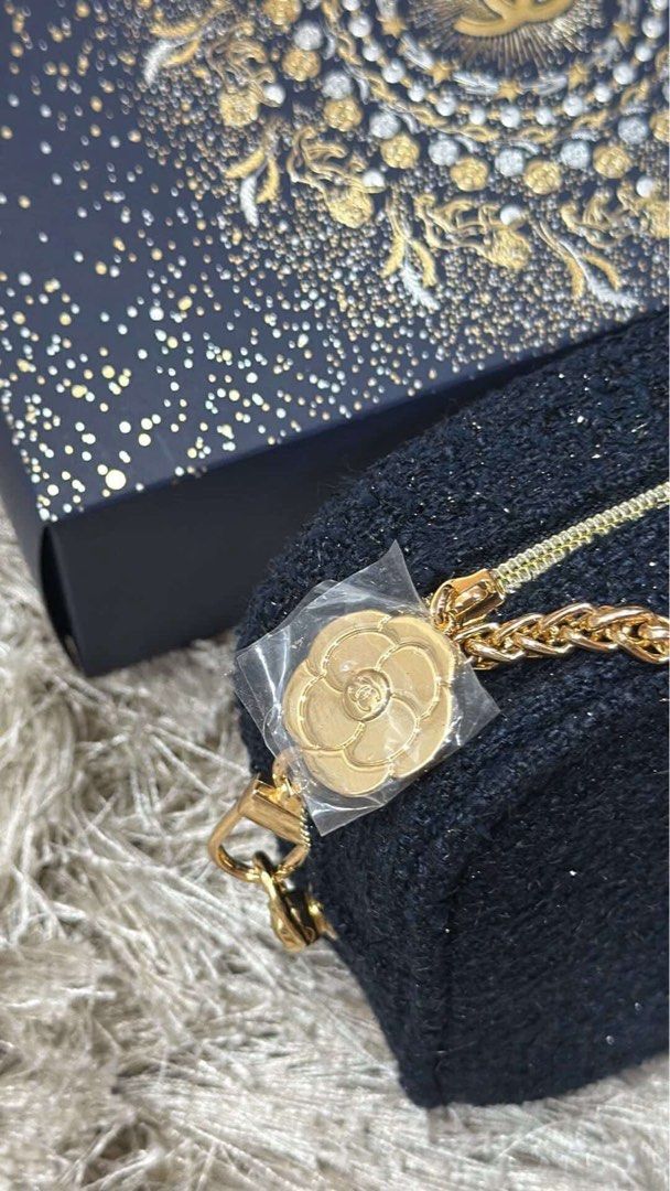 Chanel Midnight Blue Bag with Gold adjustable Chain (Category: Luxury Bags & Wallets) located in Manila. Submitted by she_jenly (Listing ID 1423124601, Image 2). Description: - 100% Authentic Chanel Beauté cosmetic bag - Black tweed exterior - Elegant gold chain strap - Gold-tone zipper pull with Chanel logo charm (Was not part of the original, just added) - Comes with original decorative box - Designed for cosmetics and small essentials .