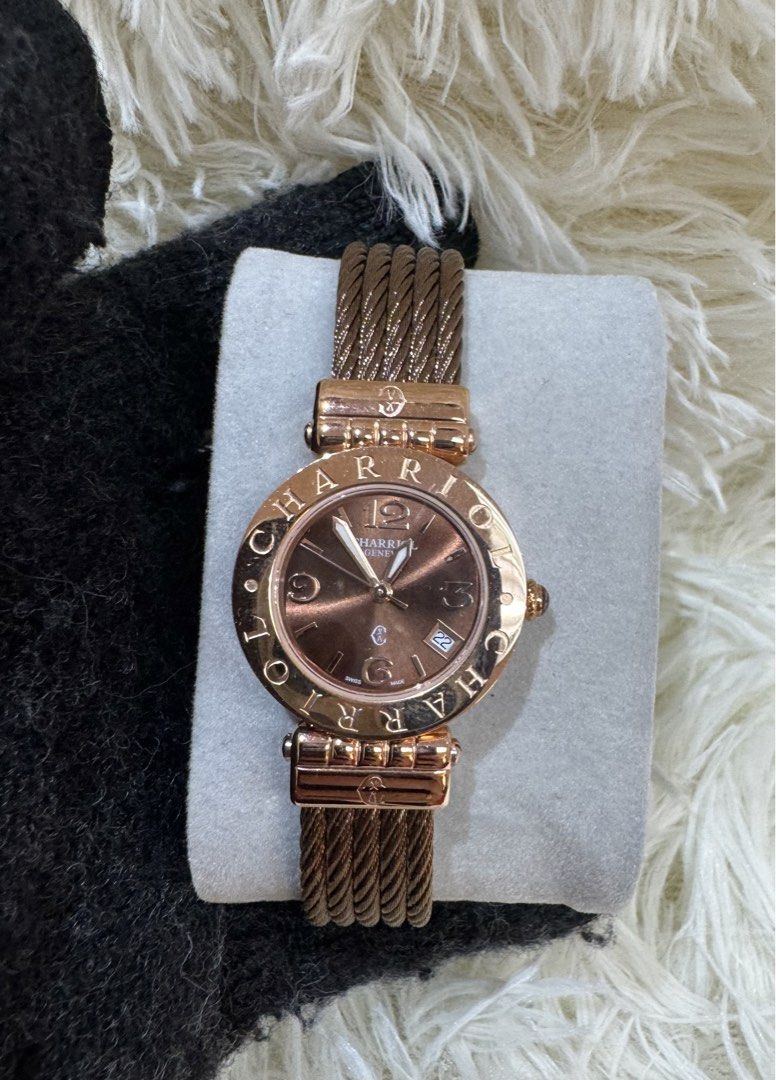 Charriol St. Tropez Brown Dial Watch (Category: Luxury Watches) located in Manila. Submitted by chloe_luxuries (Listing ID 1423186976, Image 1). Description: - Charriol St. Tropez watch - Brown dial - Rose gold-tone bezel - Unique cable bracelet - Date display at 3 o'clock - Stainless steel clasp - Charriol logo on the back -comes with box.