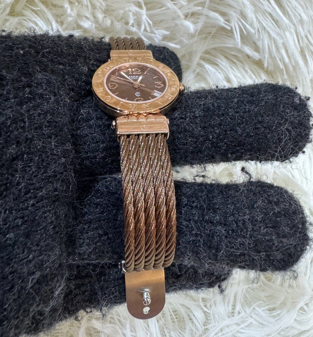 Charriol St. Tropez Brown Dial Watch (Category: Luxury Watches) located in Manila. Submitted by chloe_luxuries (Listing ID 1423186976, Image 3). Description: - Charriol St. Tropez watch - Brown dial - Rose gold-tone bezel - Unique cable bracelet - Date display at 3 o'clock - Stainless steel clasp - Charriol logo on the back -comes with box.
