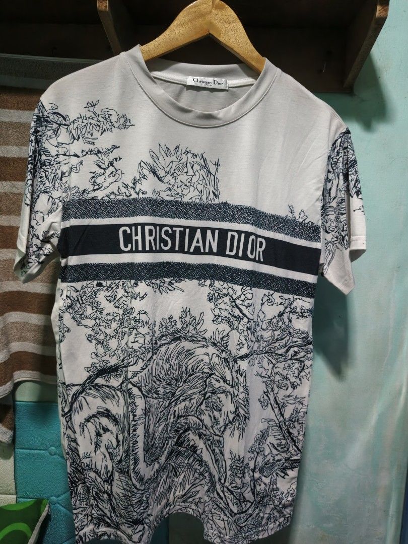 Christian Dior (Category: Tshirts & Polo Shirts ) located in Mabalacat. Submitted by thriftThings (Listing ID 1423168259, Image 1). Description: Christian Dior Polycotton Size: Medium No Issue.