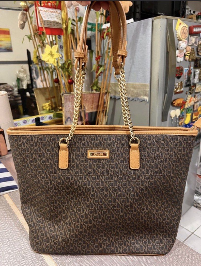 CLN Brown Tote Bag with Chain Straps (Category: Tote Bags) located in Caloocan City. Submitted by introvertshopper (Listing ID 1423152358, Image 1). Description: CLN Tote bag •Almost new (used less than 5 times) • Well-kept and stored properly • Minor issue – shown clearly in the 3rd photo • RFS: Too big for me.