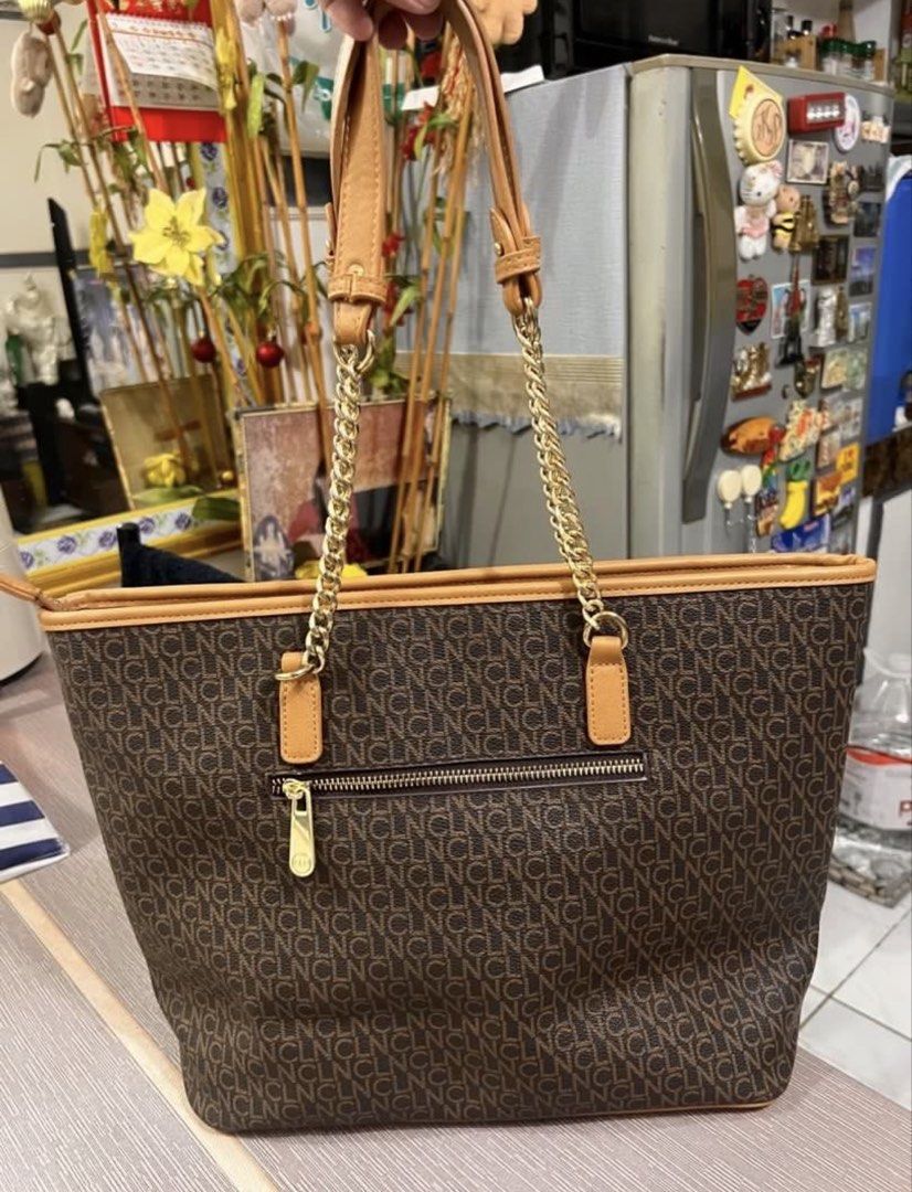 CLN Brown Tote Bag with Chain Straps (Category: Tote Bags) located in Caloocan City. Submitted by introvertshopper (Listing ID 1423152358, Image 2). Description: CLN Tote bag •Almost new (used less than 5 times) • Well-kept and stored properly • Minor issue – shown clearly in the 3rd photo • RFS: Too big for me.
