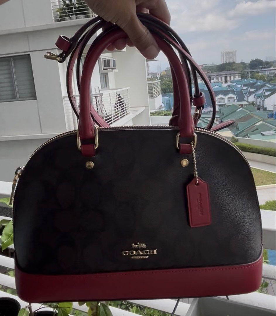 COACH MINI SIERRA (Category: Luxury Bags & Wallets) located in Quezon City. Submitted by dropshopselections (Listing ID 1423127748, Image 1). Description: original mini sierra satchel in siganture canvass with red accents handbag/crossbody approx 10 x 7 x 3.5 inches with minimal signs of use.
