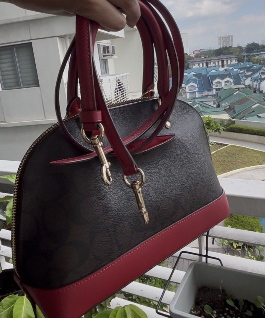COACH MINI SIERRA (Category: Luxury Bags & Wallets) located in Quezon City. Submitted by dropshopselections (Listing ID 1423127748, Image 2). Description: original mini sierra satchel in siganture canvass with red accents handbag/crossbody approx 10 x 7 x 3.5 inches with minimal signs of use.
