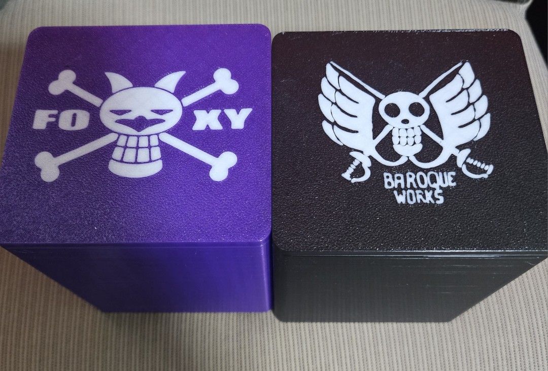 Custom TCG Deck Box Service (MTG, Riftbound, Pokemon, One Piece, Gundam, etc..) (Category: Trading Cards Accessories) located in Singapore. Submitted by hyperionxter (Listing ID 1410734645, Image 3). Description: [ Status ] Open 🌞 (last updated 1 April 2026) Card Deck Box making services. Able to mix and match colors. Able to fit 100 double sleeved cards! Dimensions(LxWxH): 8.7cm x 8.2cm x 12cm Feel free to enquire. Check our listing for custom 