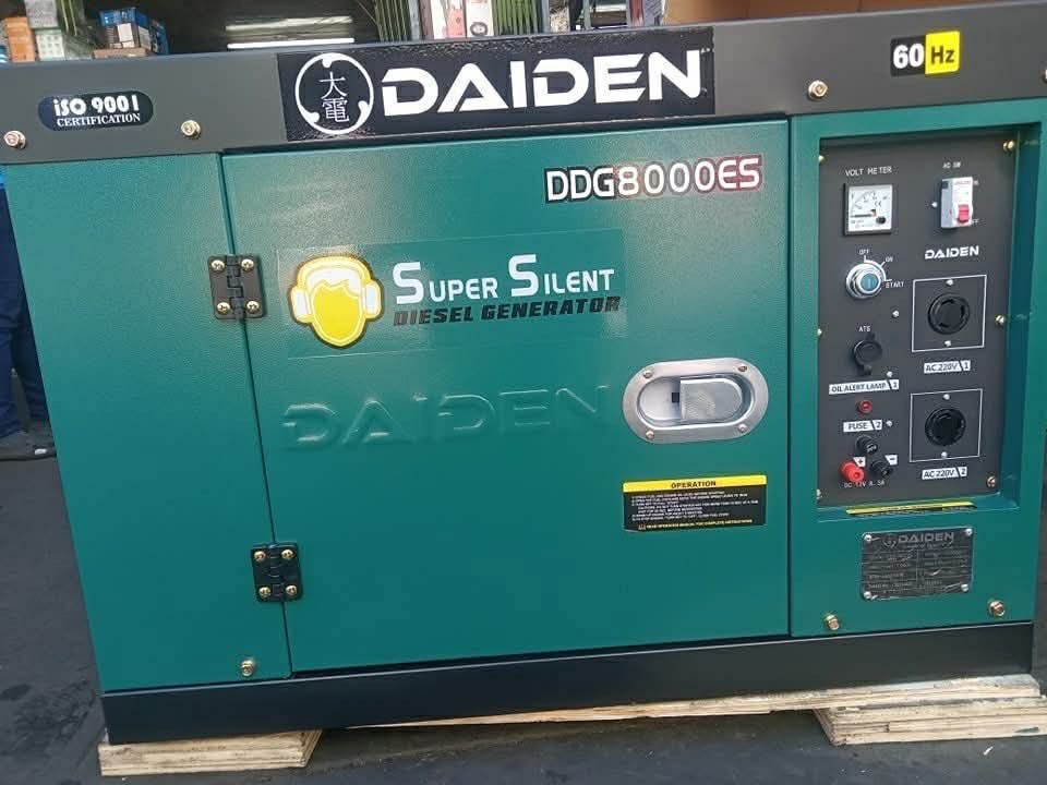 Daiden DDG8000ES Super Silent Diesel Generator (Category: Construction Tools & Equipment) located in Caloocan City. Submitted by electronicsandappliances1 (Listing ID 1423252310, Image 2). Description: Daiden DDG8000ES Super Silent Diesel Generator. Features a 60 Hz frequency. Includes AC outlets and a volt meter. The generator is designed for quiet operation. The control panel includes various indicators and switches. The unit is mounted on whee