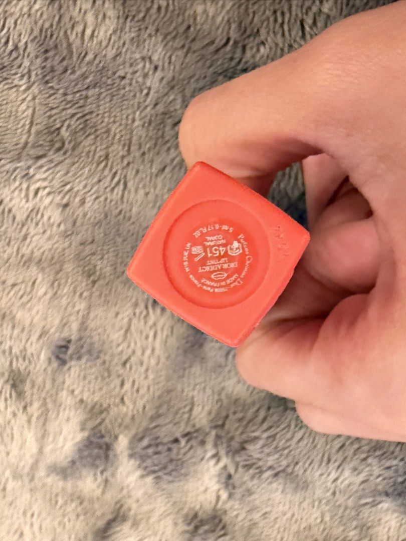 Dior Addict Liptint 451 (Category: Makeup) located in Lucena. Submitted by fashioncult.ph (Listing ID 1423110909, Image 2). Description: - Authentic Dior Addict Liptint - Shade: 451 (Vibrant Orange) - Features the iconic Dior logo - Made in France - Rectangular tube with shade details.