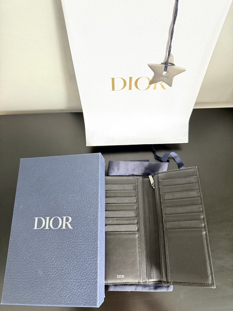 Dior CD Diamond Canvas Long Wallet (Authentic Guaranteed) (Category: Luxury Bags & Wallets) located in Makati City. Submitted by jacob.wong (Listing ID 1423153037, Image 2). Description: AUTHENTIC GUARANTEED !! - Material: Canvas / Leather - Size: 9 cm × 18 cm × 2 cm (3.5 × 7.1 × 0.8 in) - Includes: Dior paper bag with a metal star emblem / Dust bag / Case - Features: 16 card slots, 1 banknote pocket, 1 zip coin pocket, 4 additional pockets - Bla