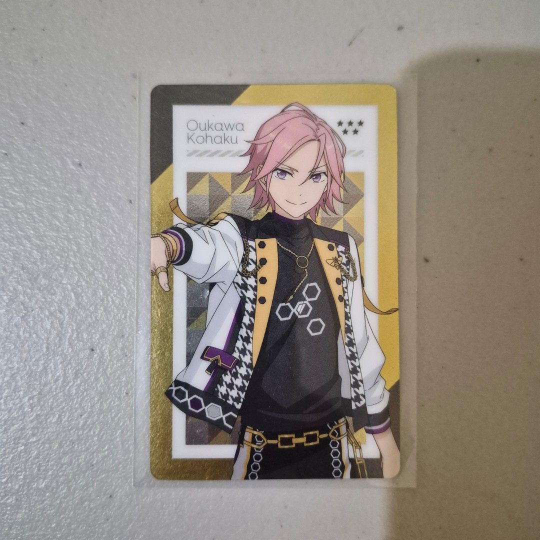 Ensemble Stars! Trading Cards (Category: Raw Singles) located in Cebu City. Submitted by snuggleplushph (Listing ID 1423186500, Image 3). Description: - Ensemble Stars! trading card set. - Featuring characters like Oukawa Kohaku and Amagi Hiro. - Cards are in protective sleeves. - Includes cards with a blue-tinted design. - Backs of cards show the Ensemble Stars! logo and character names..