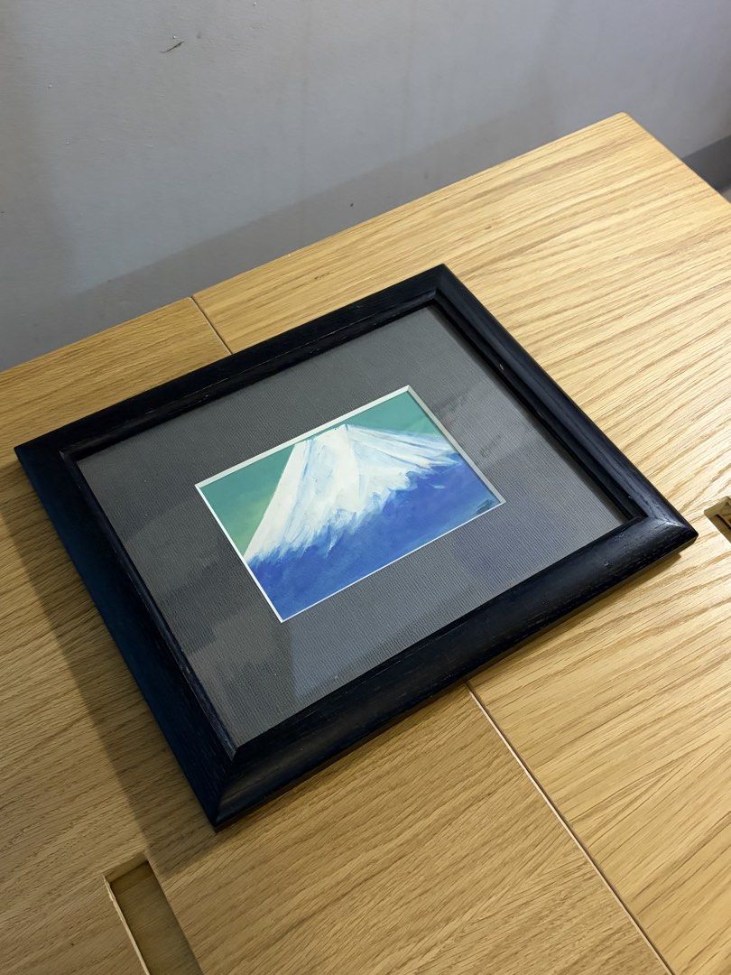 Framed Abstract Painting (Category: Art & Prints) located in Manila. Submitted by arelsnts (Listing ID 1423168273, Image 2). Description: - Framed abstract painting - Features a blue and white design - Set against a green background - Comes in a black frame - Ready to hang - Perfect for any room.