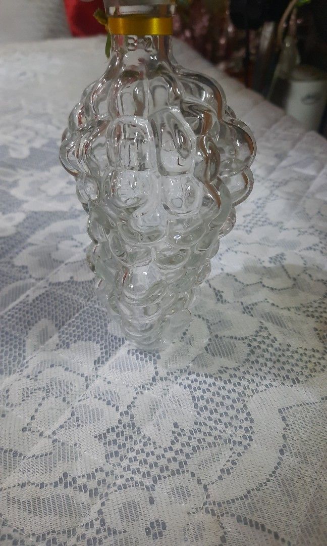 Glass bottle grape shaped 7x3" (Category: Other Kitchenware & Tableware) located in Manila. Submitted by luckycharm_215 (Listing ID 1423194638, Image 2). Description: thick glass.