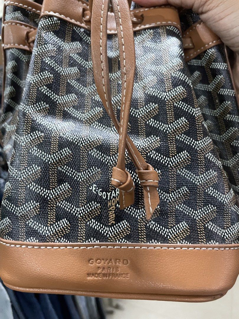 Goyard Bucket Bag (Category: Luxury Bags & Wallets) located in Puerto Princesa. Submitted by zia_zoe (Listing ID 1423147888, Image 2). Description: - Goyard bucket bag - Signature Goyardine canvas - Brown and black color scheme - Leather trim - Drawstring closure - Includes shoulder strap - Goyard logo visible - Made in France Authenticity not guarantee.