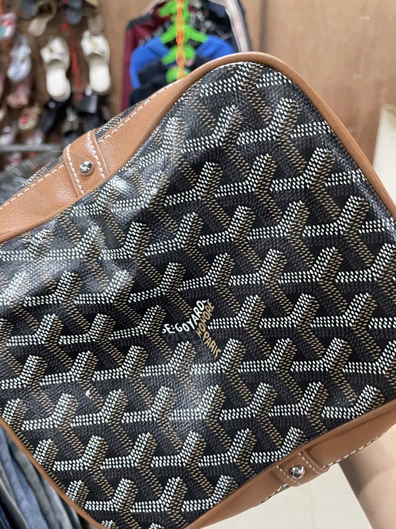 Goyard Bucket Bag (Category: Luxury Bags & Wallets) located in Puerto Princesa. Submitted by zia_zoe (Listing ID 1423147888, Image 3). Description: - Goyard bucket bag - Signature Goyardine canvas - Brown and black color scheme - Leather trim - Drawstring closure - Includes shoulder strap - Goyard logo visible - Made in France Authenticity not guarantee.