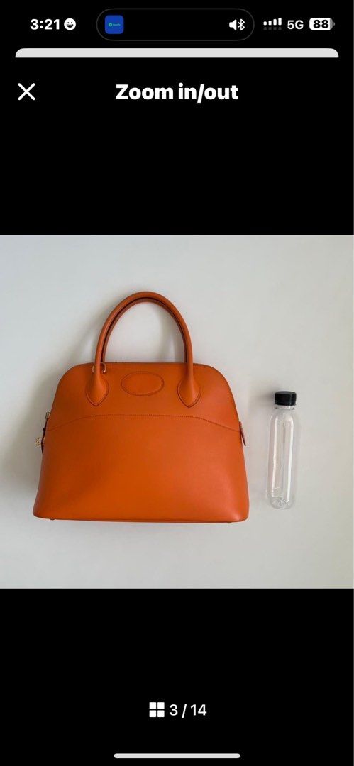 Hermes Bolide Orange Leather Handbag (Category: Luxury Bags & Wallets) located in Malolos. Submitted by yamaguchionline (Listing ID 1423085292, Image 2). Description: - Authentic Hermes handbag - Crafted from orange leather - Includes top handle and detachable shoulder strap - Secure zip closure - Elegant gold-tone hardware - Interior features Hermes stamp - Protective feet on the bottom - Made in France.
