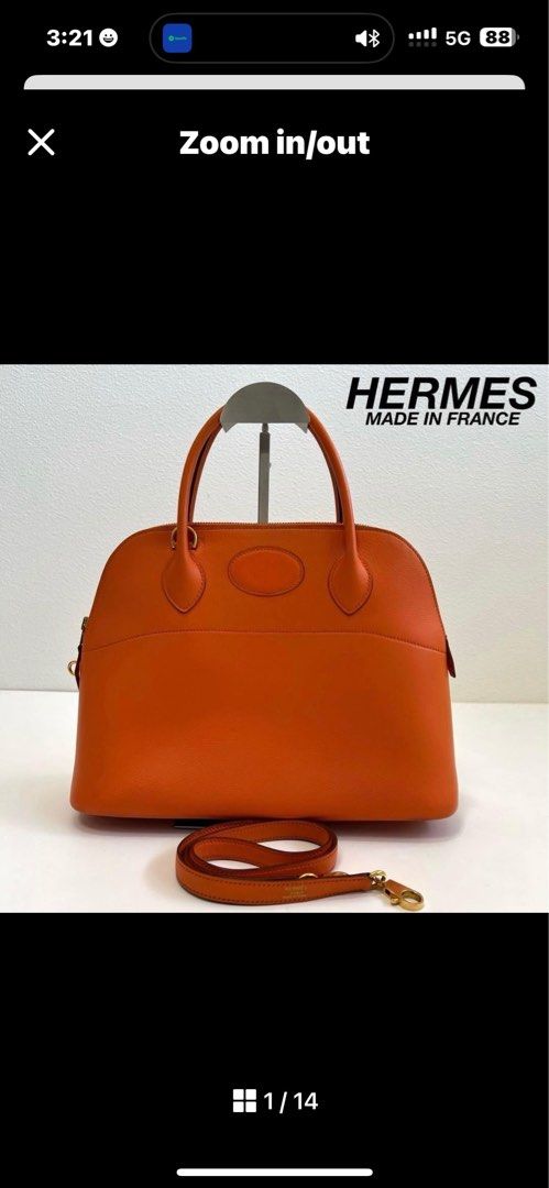 Hermes Bolide Orange Leather Handbag (Category: Luxury Bags & Wallets) located in Malolos. Submitted by yamaguchionline (Listing ID 1423085292, Image 1). Description: - Authentic Hermes handbag - Crafted from orange leather - Includes top handle and detachable shoulder strap - Secure zip closure - Elegant gold-tone hardware - Interior features Hermes stamp - Protective feet on the bottom - Made in France.