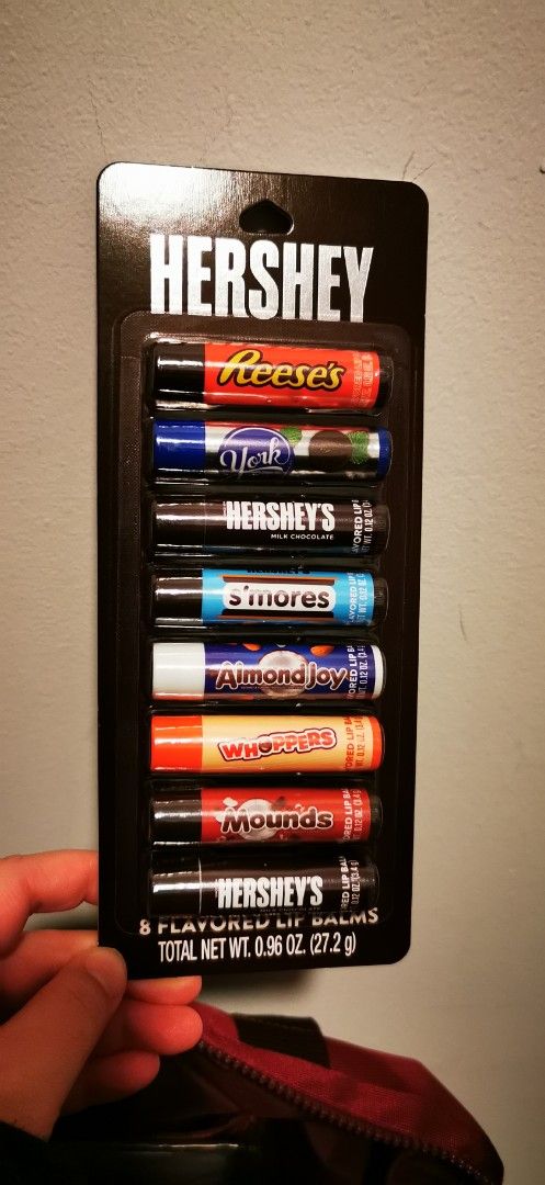 Hershey's Flavored Lip Balms Set (Category: Makeup) located in Iloilo. Submitted by k8sonlineph (Listing ID 1423252966, Image 1). Description: - Hershey's Flavored Lip Balm Set - Includes 8 Flavors: Reese's, York, Hershey's Milk Chocolate, S'mores, Almond Joy, Whoppers, and Mounds - Total Net Weight: 0.96 oz (27.2g) Taste classic Hershey's flavors with this 8-pack of balm Open for books, Toys, and other merchandise pasabuy USA Inquire by messagin