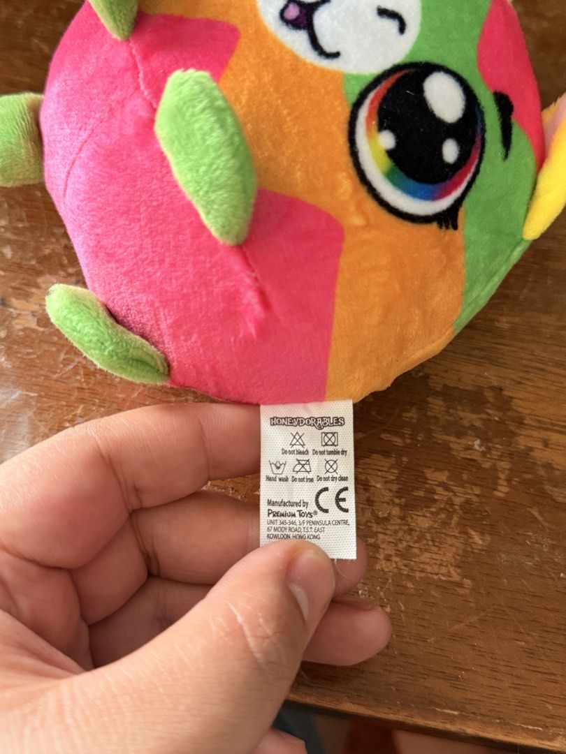 Honeydew Tales Plush Toy (Category: Plushies & Soft Toys) located in San Juan City. Submitted by findmephilippines (Listing ID 1423101007, Image 3). Description: - Honeydew Tales Llama Plush Toy - Includes a pink egg-shaped container - Made of 100% polyester - Batch Code: PT240731 - Manufactured in Dongguan, China - Features a vibrant color scheme with rainbow eyes.