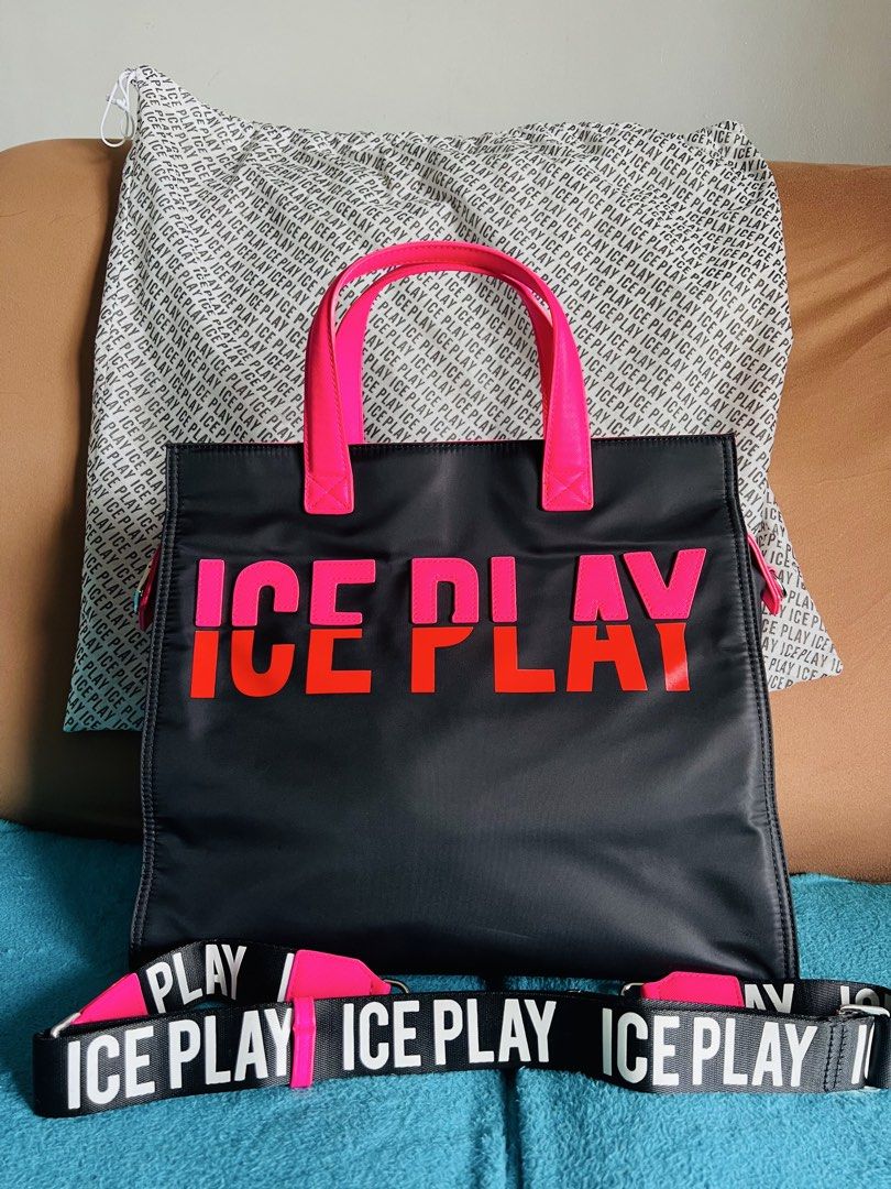 Ice Play Tote Bag with Shoulder Strap (Category: Tote Bags) located in Taguig. Submitted by Zyannah (Listing ID 1423096299, Image 1). Description: - Preloved Ice Play nylon tote bag - Black exterior with pink accents - Detachable shoulder strap with brand name - Zippered closure - Spacious interior - Includes dust bag and tags - Perfect for everyday use - MOP: BDO or GCash - MOS: Lalamove, Grab or J&T - Bought in Moscow Note: Except as expressly 