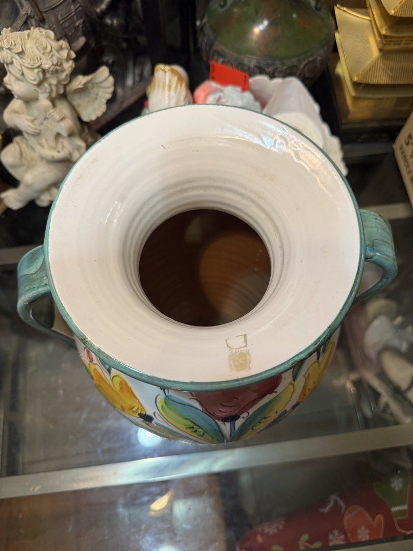 Italian Ceramic Vase with Floral Design (Category: Vases & Decorative Bowls) located in Paranaque City. Submitted by edszz (Listing ID 1423203703, Image 2). Description: Vintage Iconic Embossed Hand painted Italian Vase Good condition.