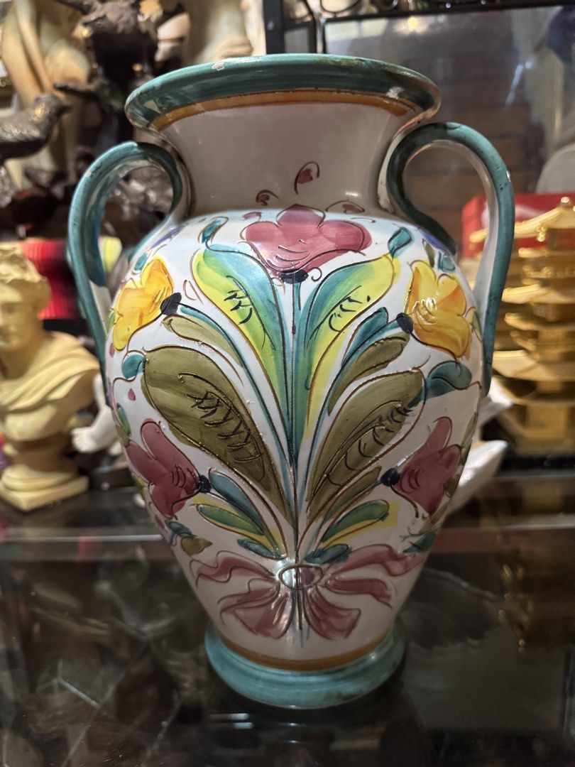 Italian Ceramic Vase with Floral Design (Category: Vases & Decorative Bowls) located in Paranaque City. Submitted by edszz (Listing ID 1423203703, Image 1). Description: Vintage Iconic Embossed Hand painted Italian Vase Good condition.