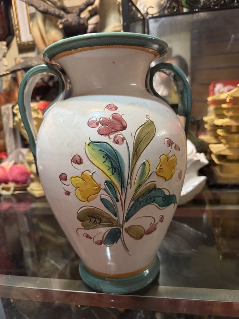 Italian Ceramic Vase with Floral Design (Category: Vases & Decorative Bowls) located in Paranaque City. Submitted by edszz (Listing ID 1423203703, Image 3). Description: Vintage Iconic Embossed Hand painted Italian Vase Good condition.