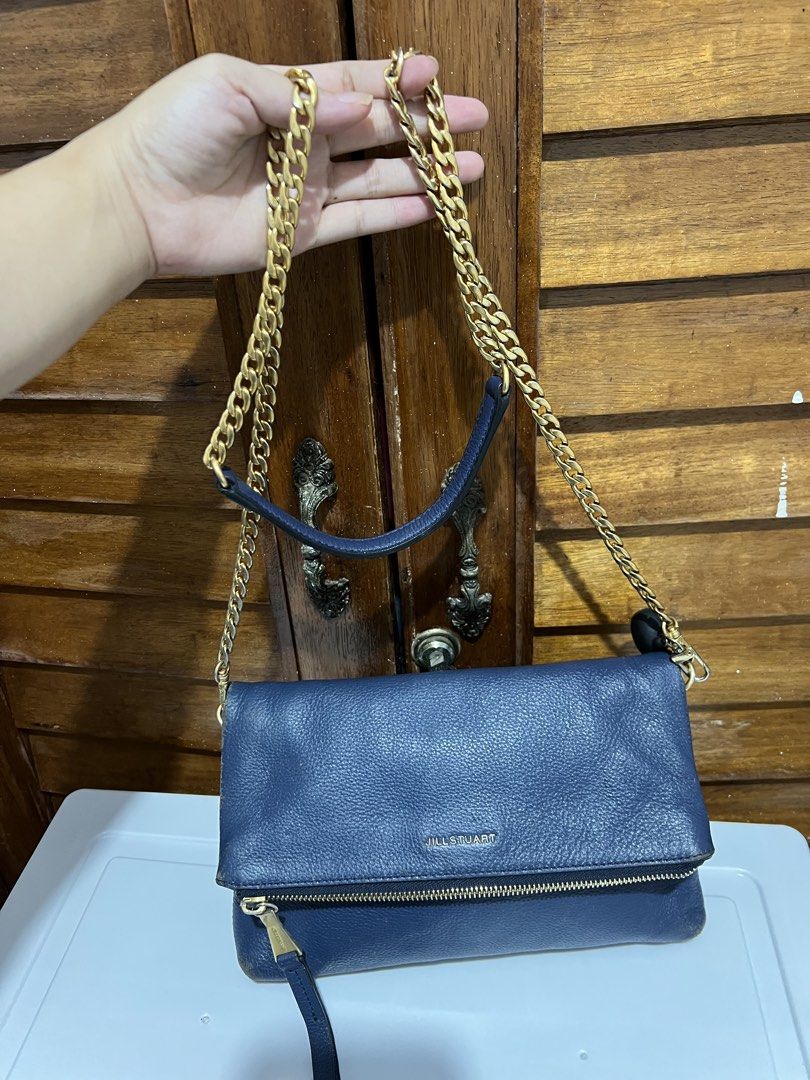 Jill Stuart Navy Blue Chain Bag (Category: Luxury Bags & Wallets) located in Tacloban City. Submitted by classy_luxury (Listing ID 1423158247, Image 1). Description: - Navy blue Jill Stuart handbag - Gold chain strap - Fold-over flap with zipper closure - Interior pocket - Gold zipper and hardware - Interior tag with brand name and model number (JA2H SE610-01).