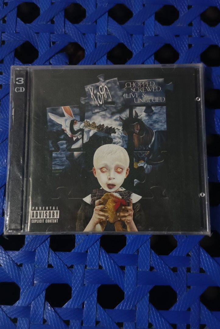 Korn Chopped, Screwed, Live & Unplugged 3 CD (Category: CDs & DVDs) located in Polomolok. Submitted by bhetto17 (Listing ID 1423208228, Image 1). Description: Korn's "Chopped, Screwed, Live & Unplugged" 3-CD set. Includes CD 1: Chopped & Screwed, CD 2: Live & Unplugged, and Bonus DVD. Features tracks like "Coming Undone" and "Hyperspace". The set is in its original packaging. for only 500 add sf sa malayo pm for more details ty.