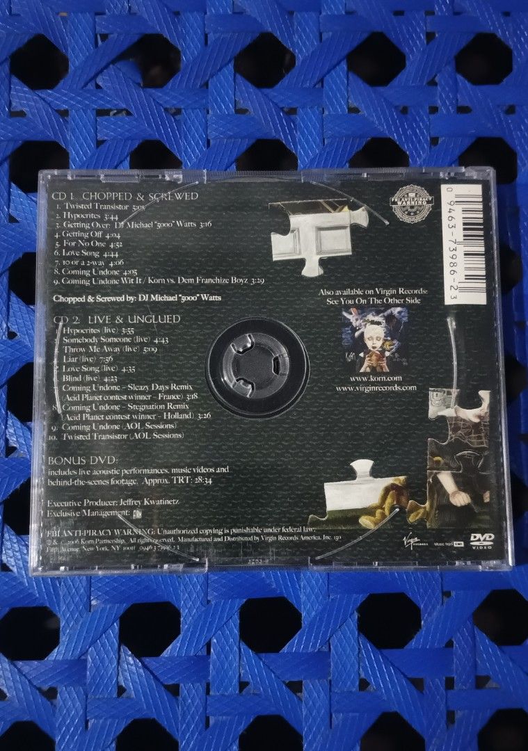 Korn Chopped, Screwed, Live & Unplugged 3 CD (Category: CDs & DVDs) located in Polomolok. Submitted by bhetto17 (Listing ID 1423208228, Image 2). Description: Korn's "Chopped, Screwed, Live & Unplugged" 3-CD set. Includes CD 1: Chopped & Screwed, CD 2: Live & Unplugged, and Bonus DVD. Features tracks like "Coming Undone" and "Hyperspace". The set is in its original packaging. for only 500 add sf sa malayo pm for more details ty.