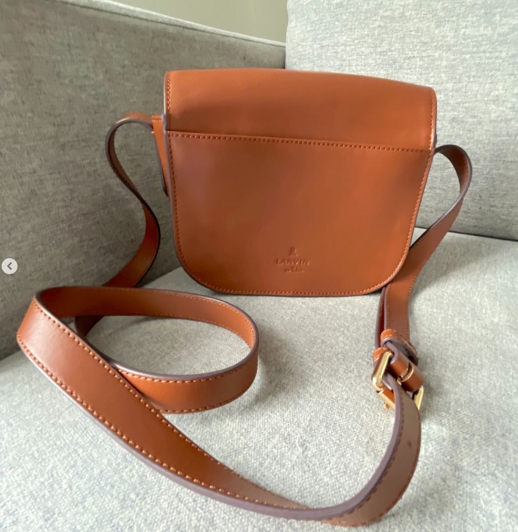 AUTHENTIC Lanvin Mini Crossbody Bag (Category: Luxury Bags & Wallets) located in Caloocan City. Submitted by ginger-feet (Listing ID 1423118450, Image 3). Description: Vintage LANV•N en Bleu Embossed Leather Crossbody bag Good condition Pre-loved, Japan sourced No box, no dustbag.