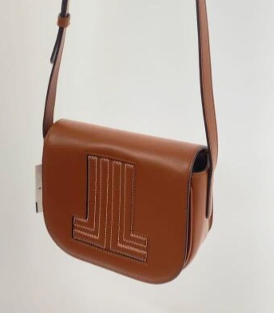 AUTHENTIC Lanvin Mini Crossbody Bag (Category: Luxury Bags & Wallets) located in Caloocan City. Submitted by ginger-feet (Listing ID 1423118450, Image 1). Description: Vintage LANV•N en Bleu Embossed Leather Crossbody bag Good condition Pre-loved, Japan sourced No box, no dustbag.