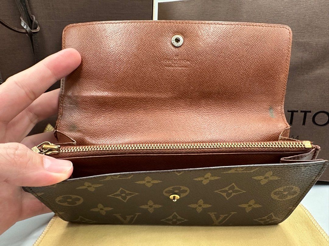 LV Sarah Long Wallet (Category: Luxury Bags & Wallets) located in Las Pinas. Submitted by tophiers (Listing ID 1423165015, Image 3). Description: FS: Louis Vuitton Sarah Monogram Long Wallet . Pls see the actual photos and the condition, on one side the stitching is loose and may need minor repairs at the end of the buyer but is still is presentable and still has a long life. I am including a genuine LV box, dustbag for the wallet and a paperbag 