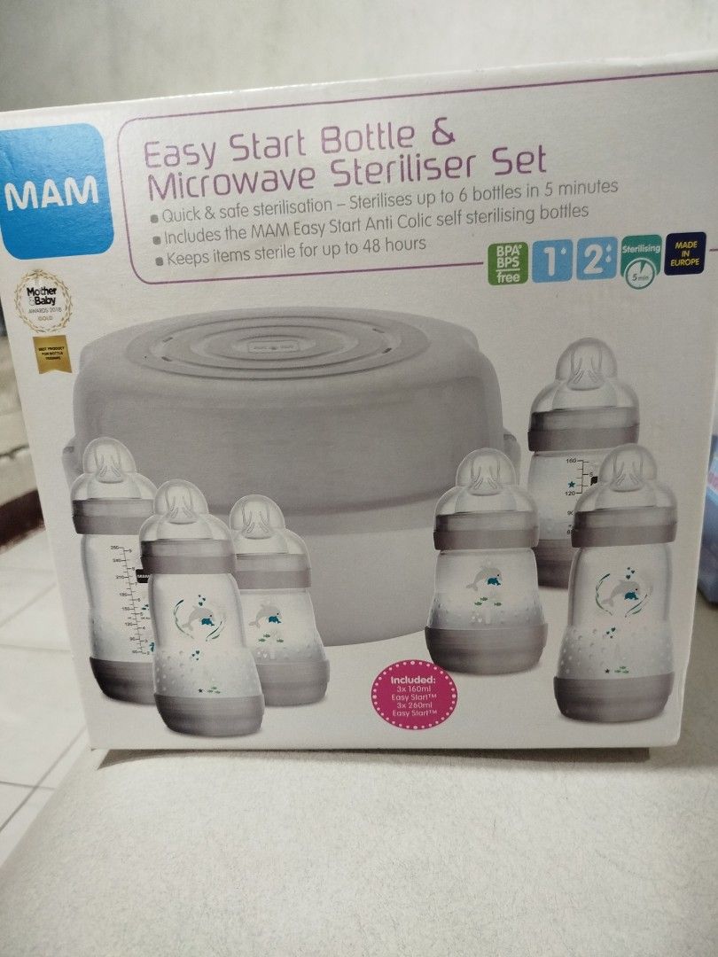 MAM Easy Start Bottle & Microwave Steriliser Set (Category: Breastfeeding & Bottle Feeding) located in Quezon City. Submitted by carleldrin (Listing ID 1423157001, Image 1). Description: MAM Easy Start Bottle & Microwave Steriliser Set. Sterilizes up to 6 bottles in 5 minutes. Includes MAM Easy Start Anti Colic self sterilising bottles. Keeps items sterile for up to 48 hours. The set includes the sterilizer and several bottles. The bottles have a