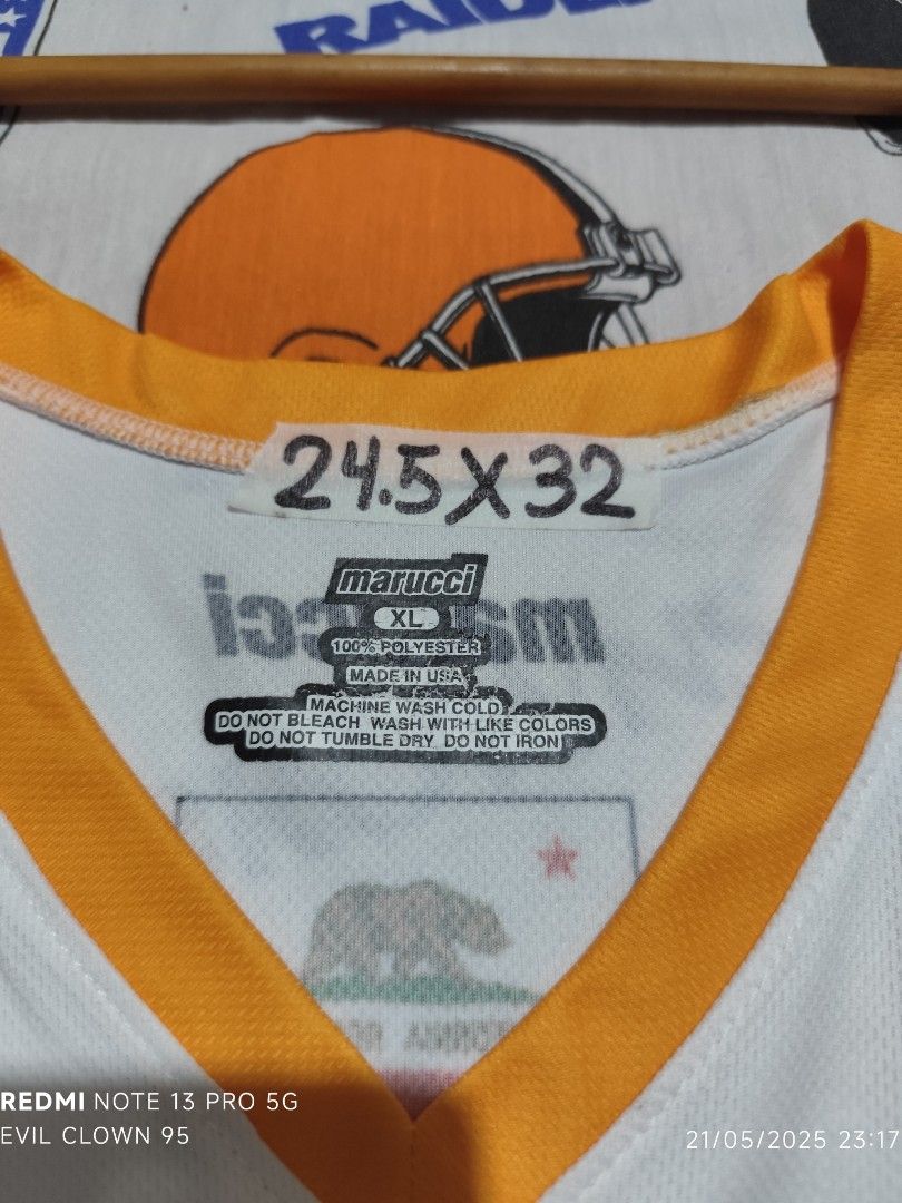 Marucci Hornets Baseball Jersey XL (Category: Tshirts & Polo Shirts ) located in Baguio. Submitted by FRANKLIN (Listing ID 1423160473, Image 3). Description: - Marucci Hornets baseball jersey - Features the number 27 - "Hornets" text on the front - White base with orange accents - Hornets logo on the sleeve - Made of 100% polyester - Size: XL - Measurements: 24.5 x 32.