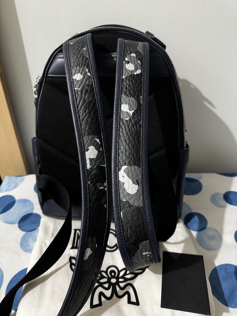 MCM Stark Backpack (Category: Luxury Bags & Wallets) located in Pasay City. Submitted by mydeer08 (Listing ID 1423240715, Image 3). Description: - Authentic MCM Stark backpack - Navy blue color - Unique front pocket design - Multiple zippered compartments - Adjustable straps - Includes dust bag and authenticity card - MCM logo and serial number on interior tag - Top handle for easy carrying - 100% Authentic -can pass as brand new .
