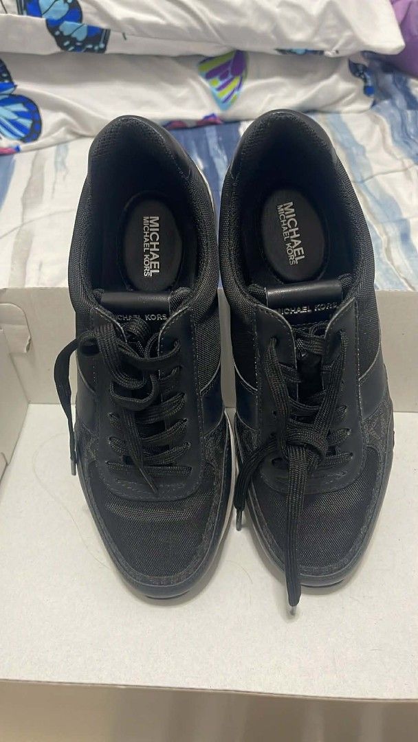 Michael Kors Arlo Trainer Sneakers - Black (Category: Casual Shoes) located in Masinloc. Submitted by ih8p6 (Listing ID 1423231960, Image 3). Description: - NEGOTIABLE!!! - Michael Kors Arlo Trainer sneakers - Color: Black - Size: US 6.5M - Features MK logo - Black and white sole - Material: Fabric and leather (as indicated on the box) - Includes original box.