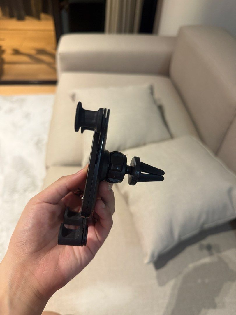 Mypro Car Phone Holder (Category: Mounts & Holders) located in Quezon City. Submitted by tinebcloset (Listing ID 1423194747, Image 2). Description: - Securely holds your phone while driving. - Attaches to your car's air vent. - Black color. - Easy to install and use. - Provides convenient phone accessibility..