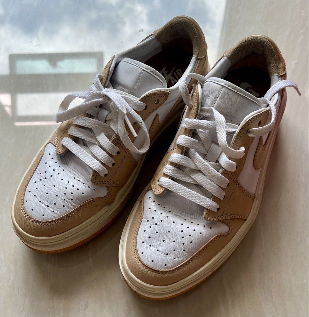 Nike Air Jordan 1 Elevate Low - White/Onyx (Category: Sneakers) located in Mandaluyong City. Submitted by rhenaa (Listing ID 1423108662, Image 2). Description: - Nike Air Jordan 1 Elevate Low - Color: White and Tan - Features a platform sole - Includes original box - US Size: 8.5 - Euro Size: 40 - UK Size: 6 - White laces - Nike and Jordan logos on soles.
