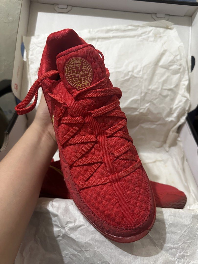 Nike LeBron XVII Low PH University Red (Category: Sneakers) located in Santa Rosa. Submitted by queenluns (Listing ID 1423164778, Image 1). Description: - Nike LeBron XVII Low PH - Color: University Red with gold accents - Size: US 9.5 - Includes original box - Includes Titan card - Features Titan logo on insole.