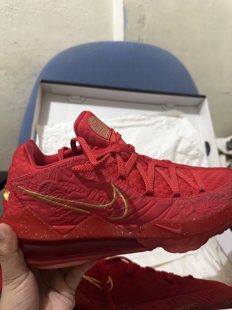 Nike LeBron XVII Low PH University Red (Category: Sneakers) located in Santa Rosa. Submitted by queenluns (Listing ID 1423164778, Image 3). Description: - Nike LeBron XVII Low PH - Color: University Red with gold accents - Size: US 9.5 - Includes original box - Includes Titan card - Features Titan logo on insole.