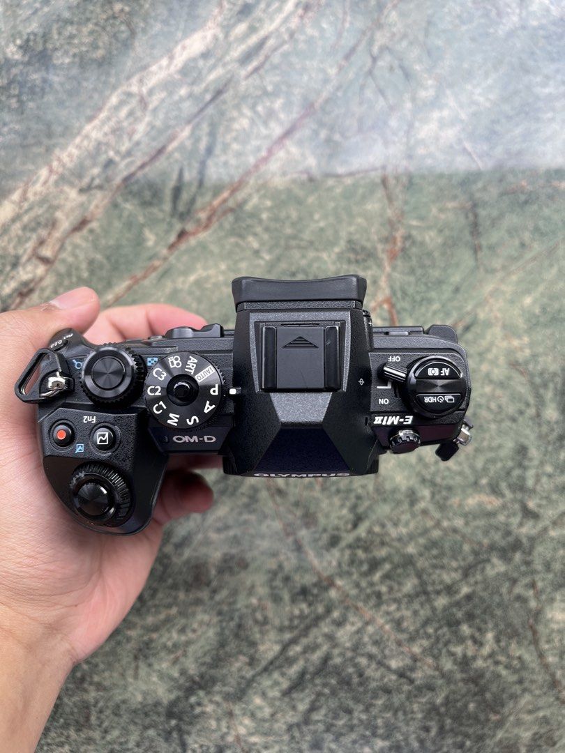 Olympus EM1 Mark ii Mirrorless MFT/M43 Camera (Category: Cameras) located in Paranaque City. Submitted by wynnnnnnn (Listing ID 1423247128, Image 2). Description: Olympus EM1 Mark ii Mirrorless MFT/M43 Camera Condition: 9/10 Asking price: 35k Inclusions: battery and charger No issues Other lenses for sale: Panasonic 14-42 PZ f3.5-5.6 pancakelens Meike 28 f2.8 pancake lens Rokinon 7.5 f3.5 Fisheye 7artisans 50 f1.4 7artisans 25 f1.7 Panasonic 35-1