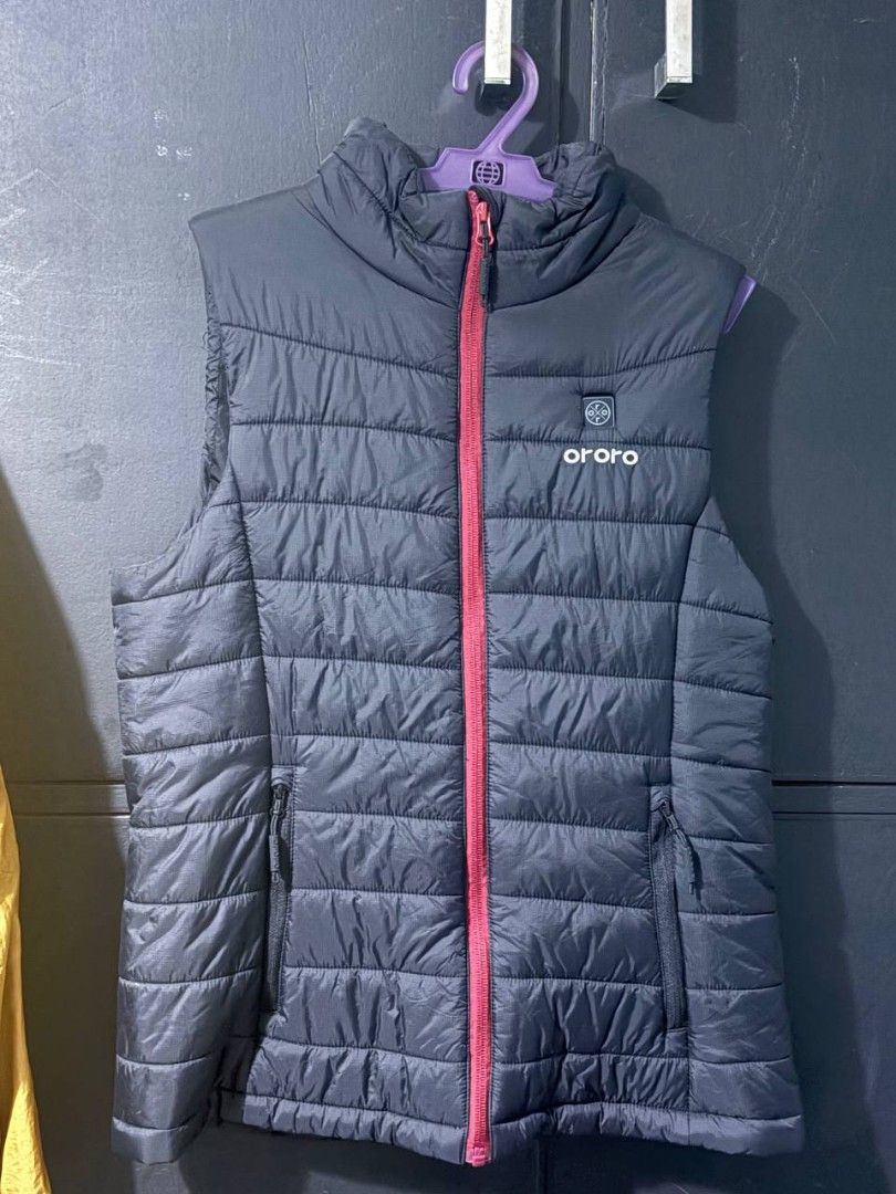Ororo Heated Black Puffer Vest (Category: Vests) located in Manila. Submitted by Rhidell (Listing ID 1423174539, Image 3). Description: - Ororo puffer vest - Color: Black - Size: USA S - Red zipper - Two front pockets - High collar - Ororo logo on chest and back - Designed for challenging climates.