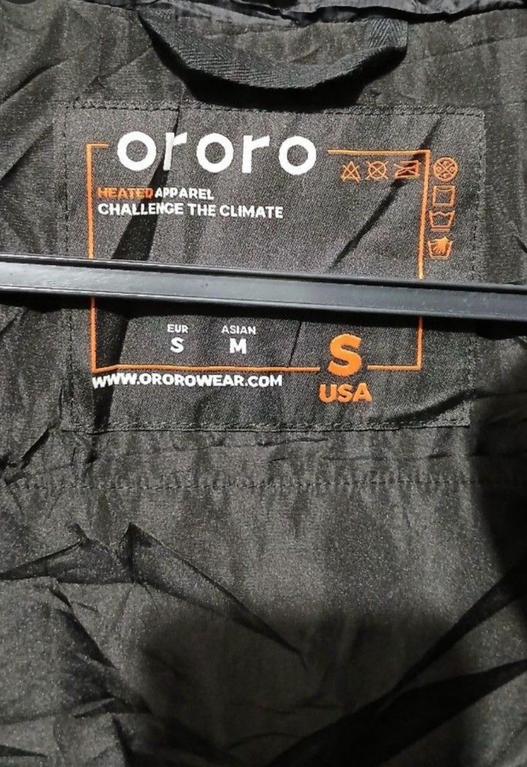 Ororo Heated Black Puffer Vest (Category: Vests) located in Manila. Submitted by Rhidell (Listing ID 1423174539, Image 2). Description: - Ororo puffer vest - Color: Black - Size: USA S - Red zipper - Two front pockets - High collar - Ororo logo on chest and back - Designed for challenging climates.