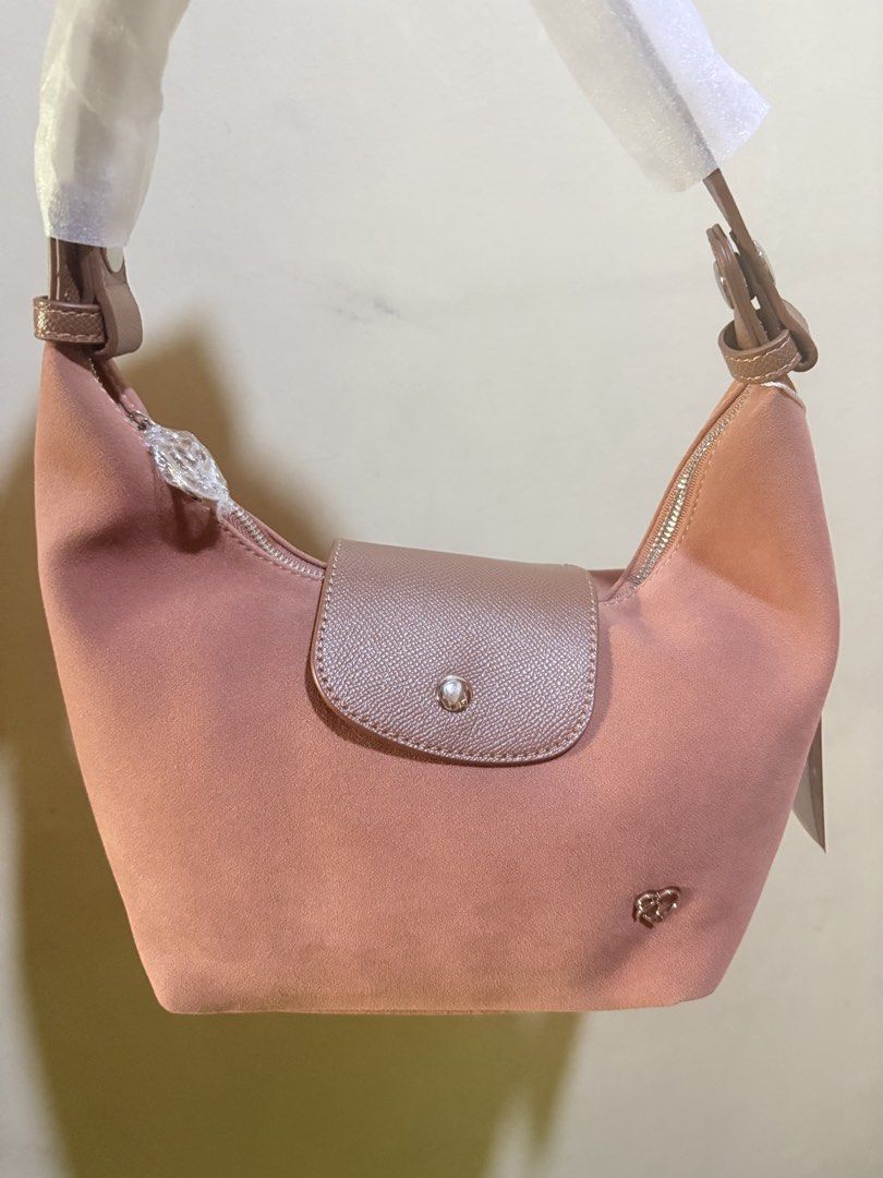 Ponypony Brand Shoulder Bag (Category: Luxury Bags & Wallets) located in Makati City. Submitted by lesslaystreet (Listing ID 1423133019, Image 2). Description: 💯ORIG with tag, dust bag , eco bag of Pony Size: small suede Color: Nude Free SF NO MEET UP.